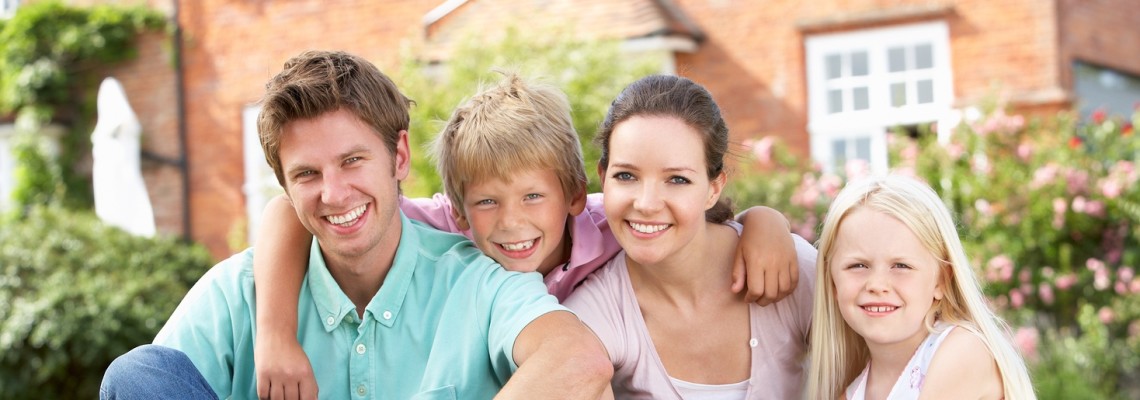 Photo of a family smiling